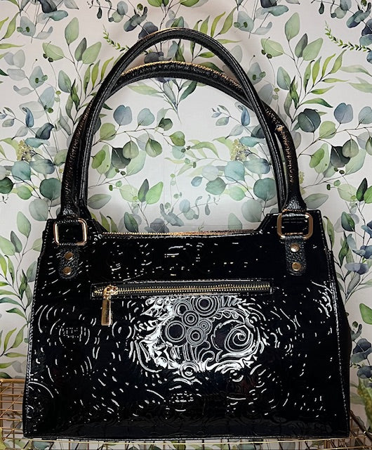 The Patent Cross Body